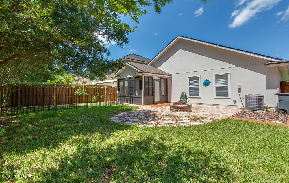 1243 Splendid Ravine Street St. Augustine, FL 32092 - Photo 26 of 28 1243 Splendid Ravine Back of house_patio