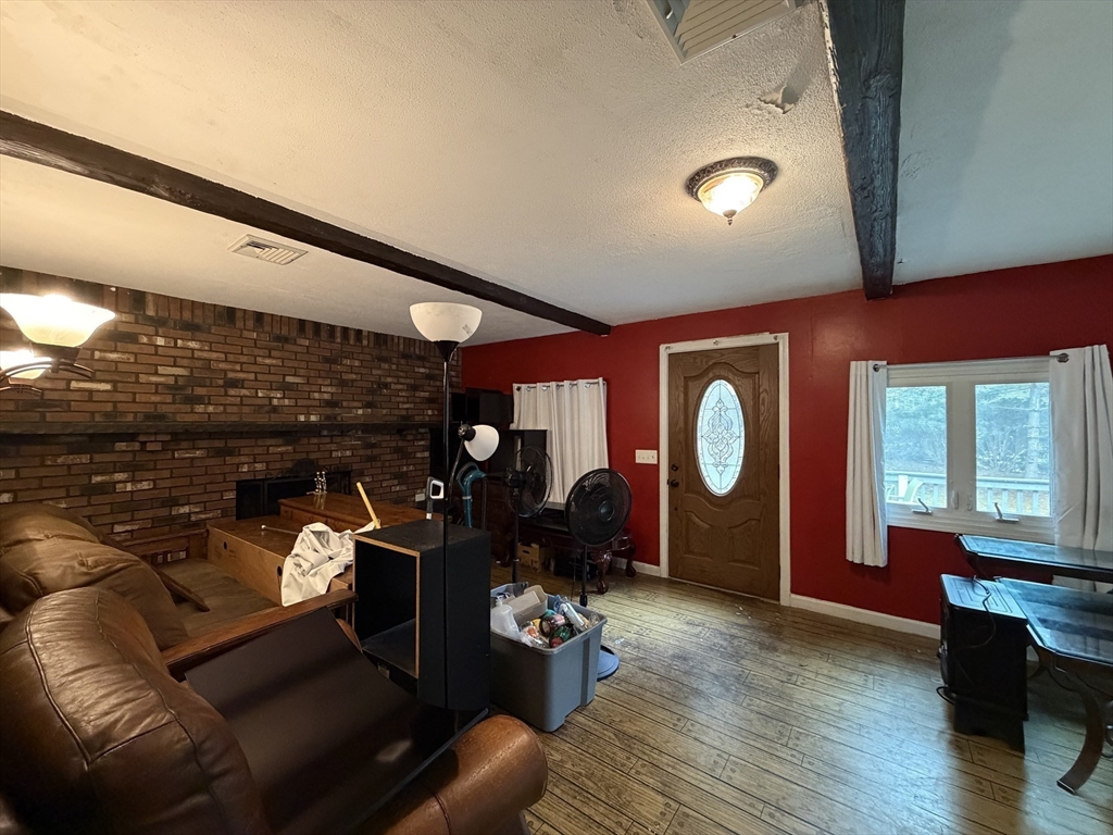264 Flynt Street Palmer, MA 01069 - Photo 11 of 21 a living room with furniture and a large window