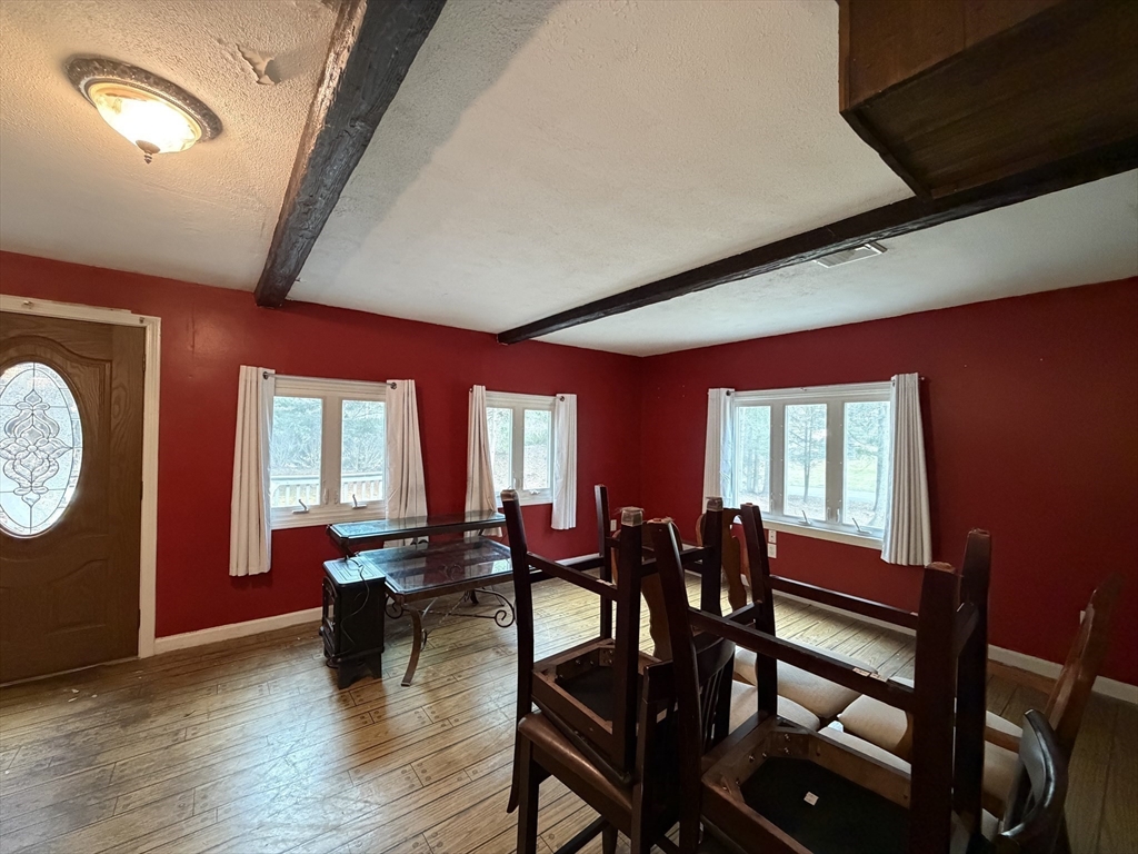 264 Flynt Street Palmer, MA 01069 - Photo 12 of 21 a view of a dining room with furniture window and wooden floor