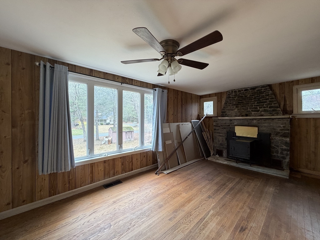 264 Flynt Street Palmer, MA 01069 - Photo 13 of 21 a living room with furniture and a fireplace