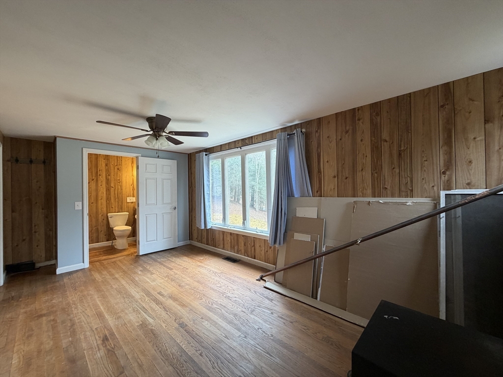 264 Flynt Street Palmer, MA 01069 - Photo 15 of 21 a view of livingroom with hardwood floor and window