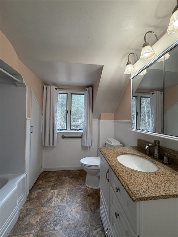 264 Flynt Street Palmer, MA 01069 - Photo 19 of 21 a bathroom with a granite countertop sink toilet and mirror