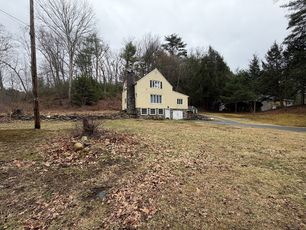 264 Flynt Street Palmer, MA 01069 - Photo 2 of 21 a view of a house with a yard