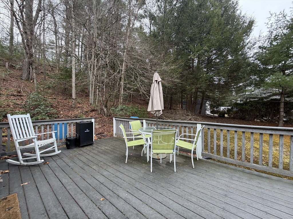 264 Flynt Street Palmer, MA 01069 - Photo 21 of 21 a view of a chairs and table on the wooden floor
