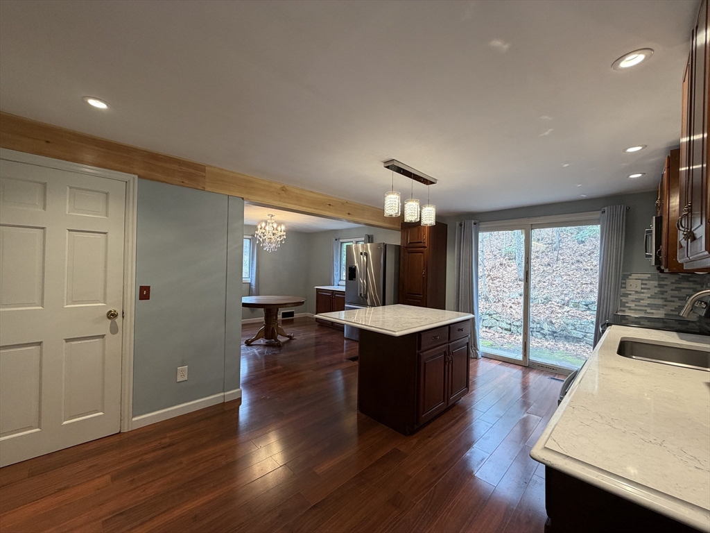 264 Flynt Street Palmer, MA 01069 - Photo 4 of 21 a view of living room with furniture and wooden floor