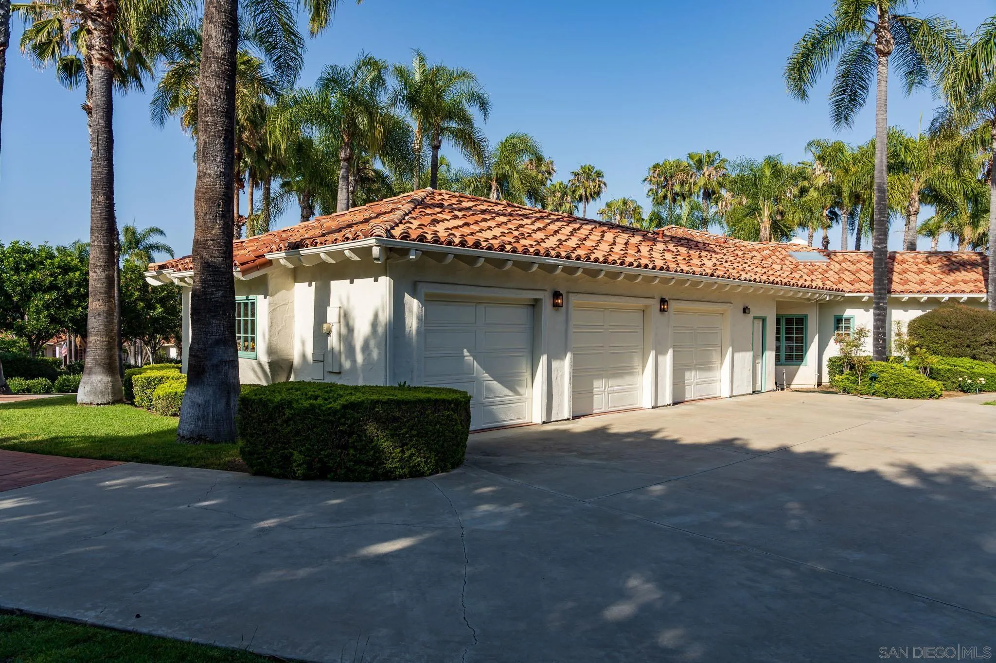 18221 Via Ascenso Rancho Santa Fe, CA 92067 - Photo 33 of 37 a front view of a house with a garden