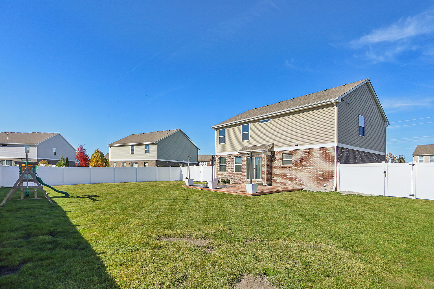 1672 Glenbrooke Lane New Lenox, IL 60451 - Photo 15 of 15 a view of a house with a big yard and large tree