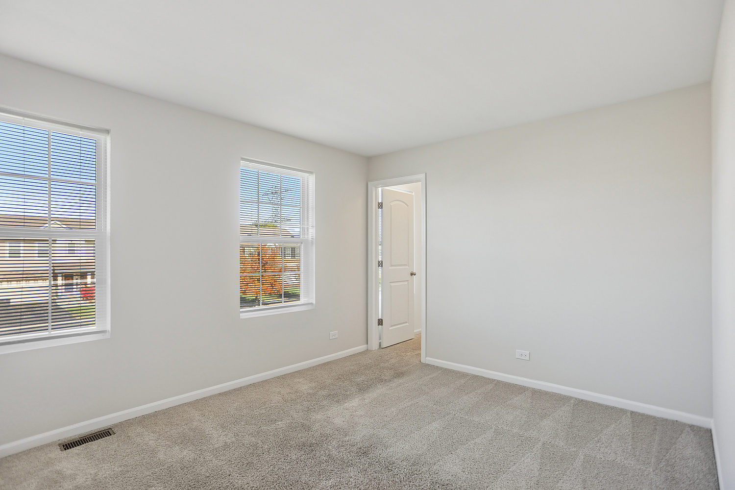 1672 Glenbrooke Lane New Lenox, IL 60451 - Photo 8 of 15 an empty room with windows