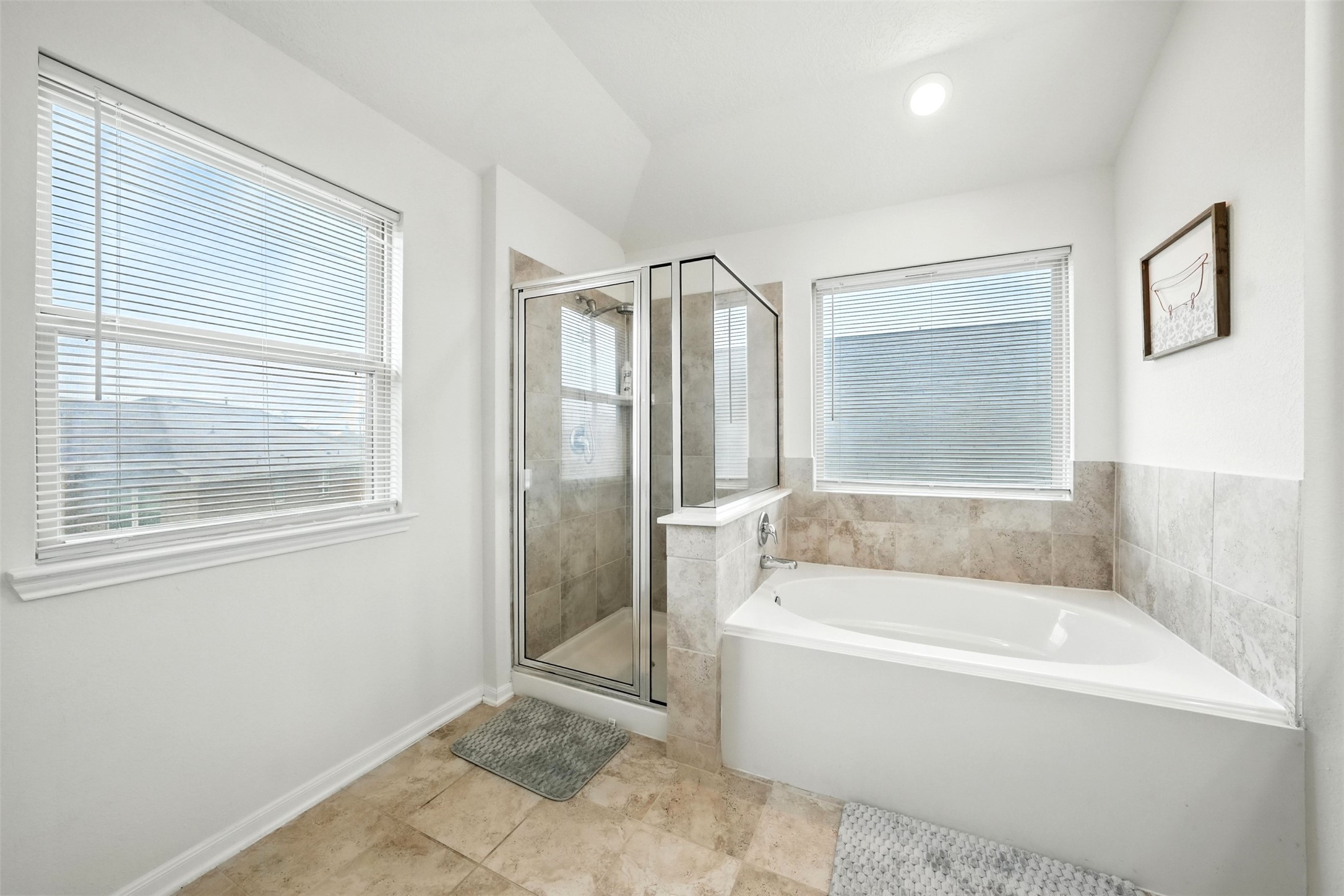 15410 Rosehill Summit Lane Houston, TX 77044 - Photo 19 of 30 a bathroom with a bathtub and a shower