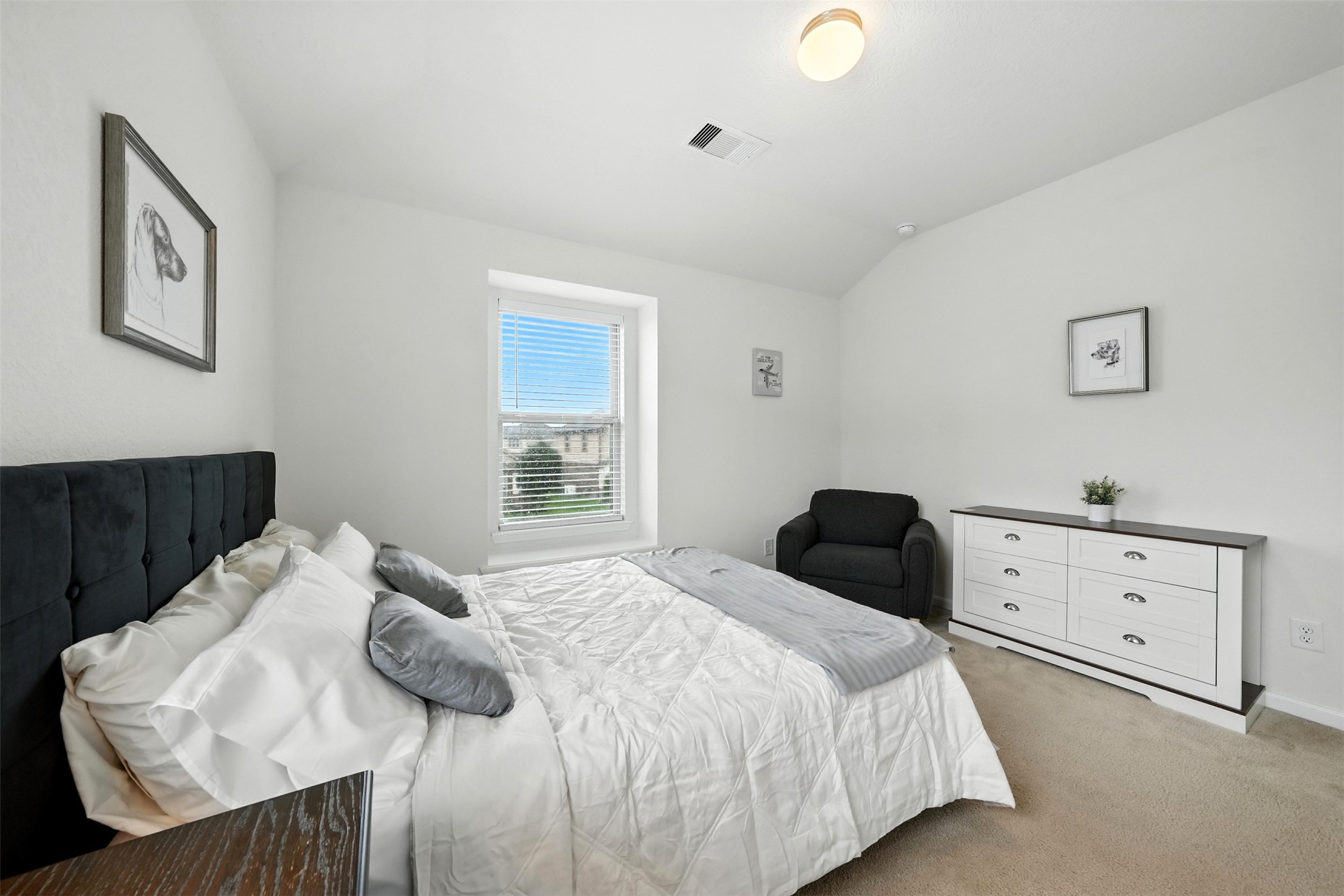 15410 Rosehill Summit Lane Houston, TX 77044 - Photo 24 of 30 a bedroom with a bed and a window