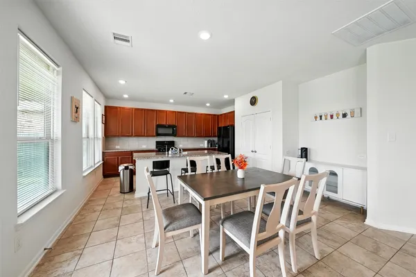 a view of a dining room with furniture