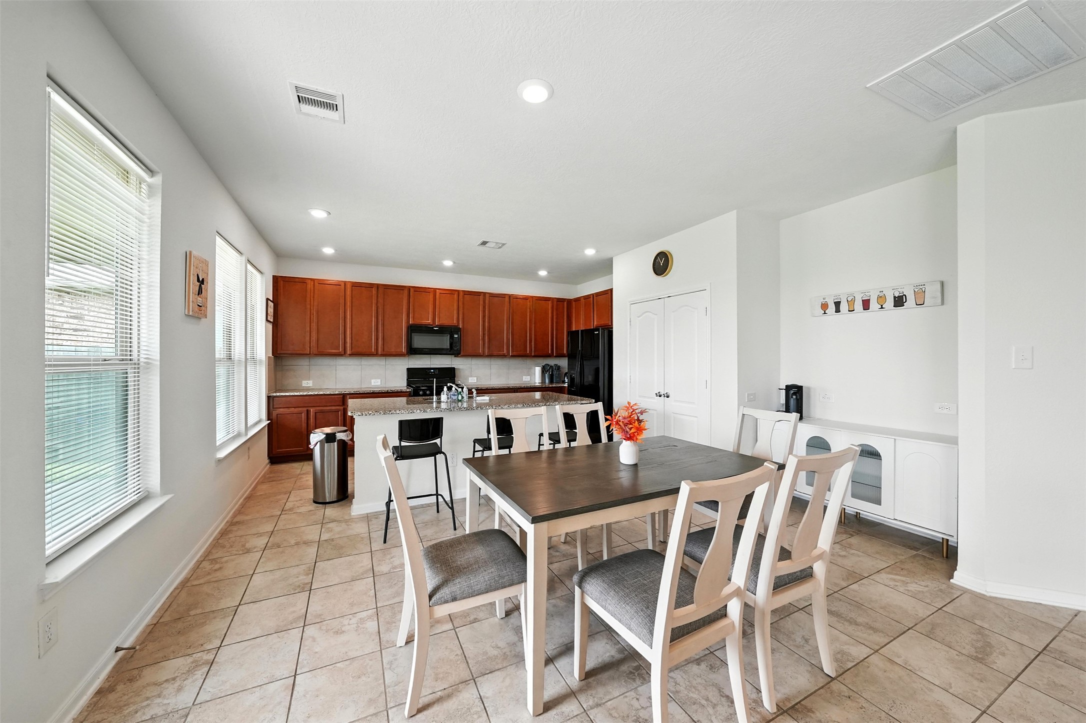15410 Rosehill Summit Lane Houston, TX 77044 - Photo 10 of 30 a view of a dining room with furniture