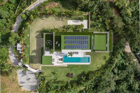 a view of a city with mountains in the background