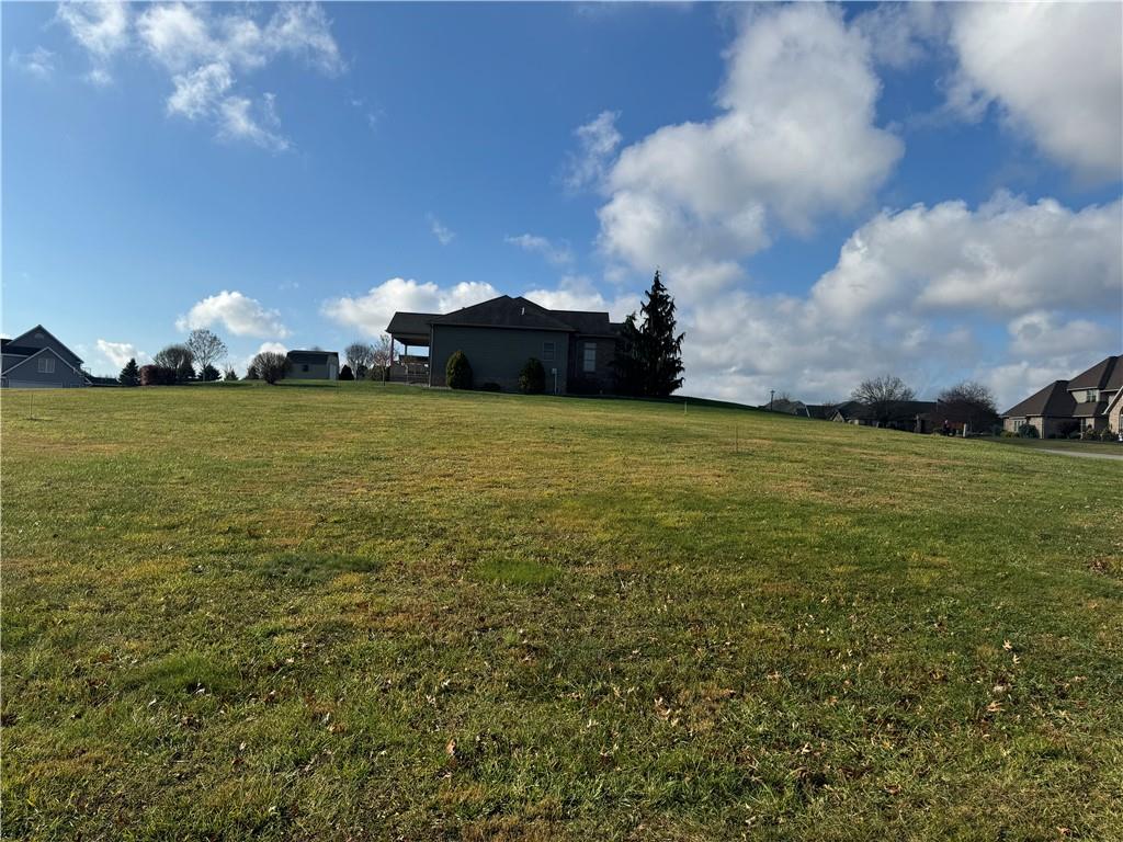 163 Huckleberry Road Indiana, PA 15701 - Photo 5 of 6 a big yard with lots of tress in it