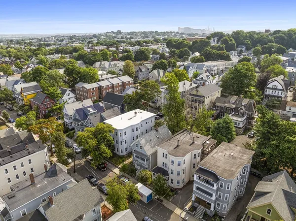 an aerial view of a city with lots of residential buildings