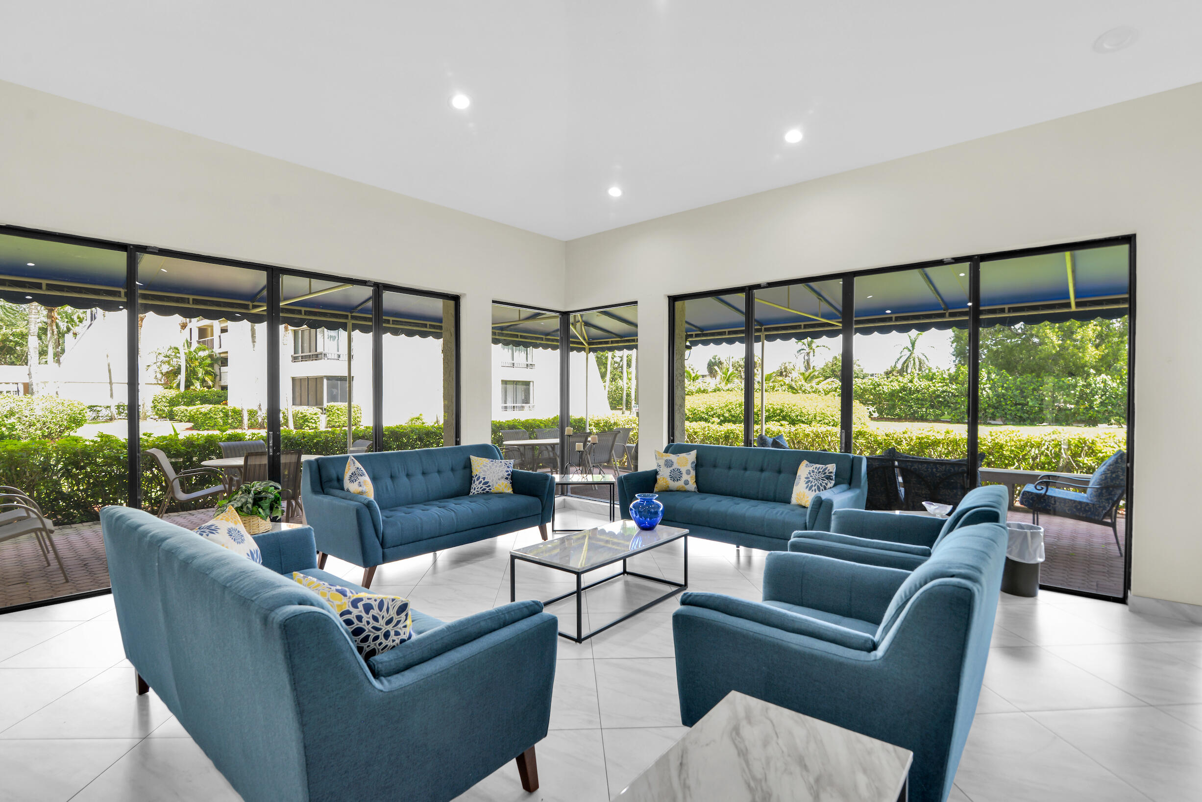 6620 Boca De Mar Drive, Unit 105 Boca Raton, FL 33433 - Photo 27 of 32 a living room with furniture and a large window