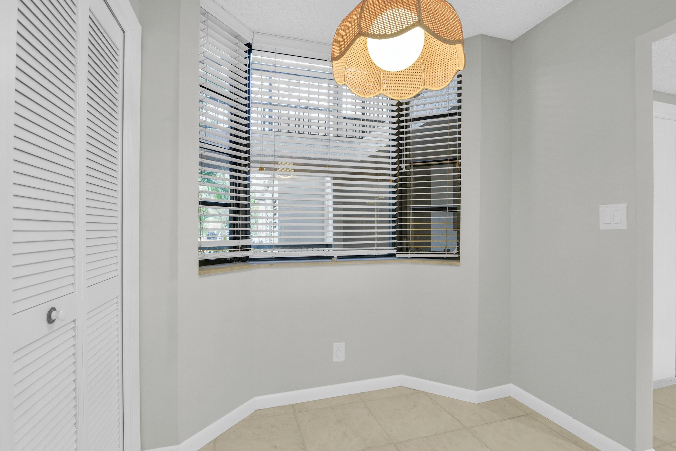 6620 Boca De Mar Drive, Unit 105 Boca Raton, FL 33433 - Photo 5 of 32 a view of a window in a room