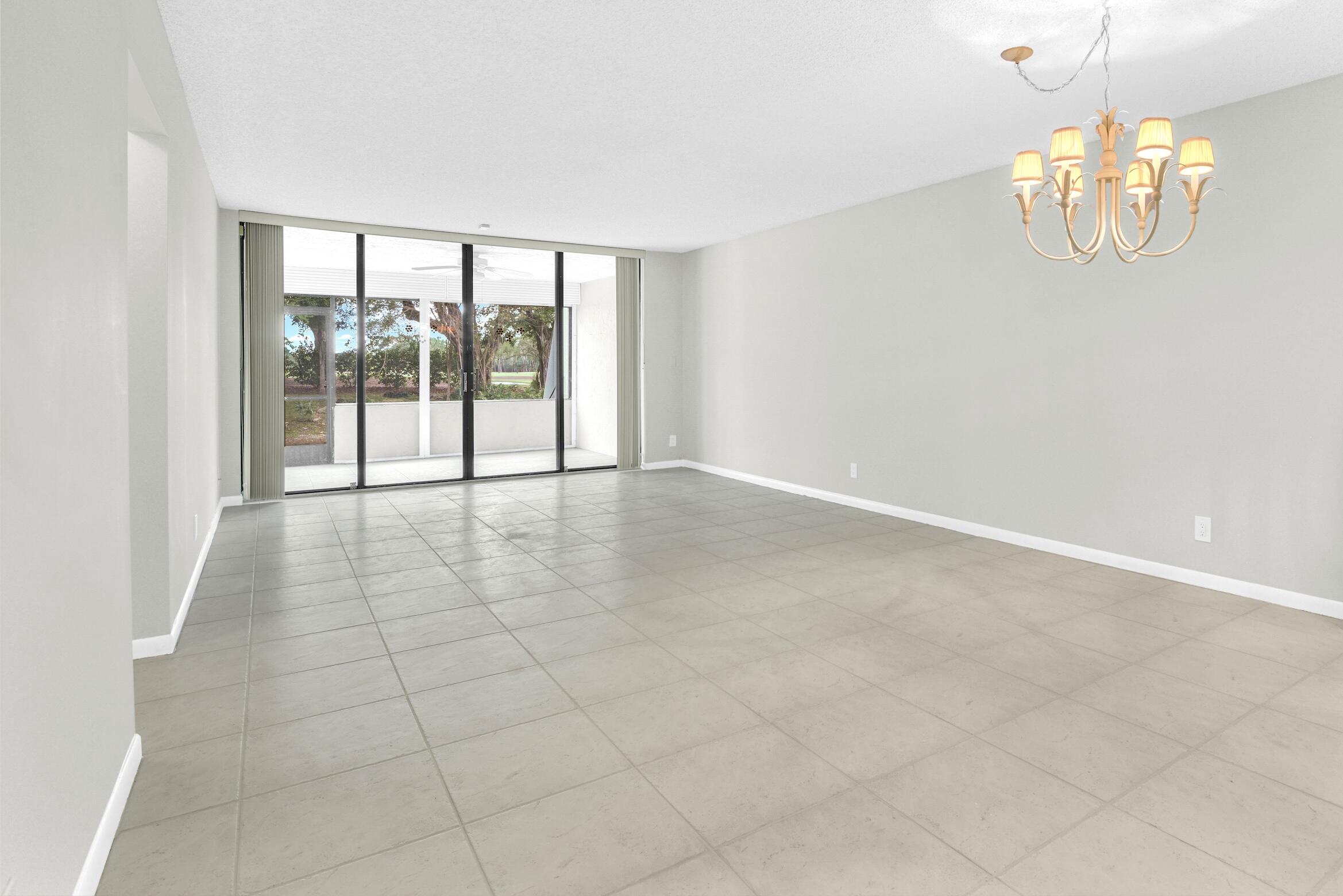 6620 Boca De Mar Drive, Unit 105 Boca Raton, FL 33433 - Photo 6 of 32 a view of an empty room with a window