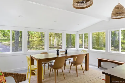 a dining room with table and chair