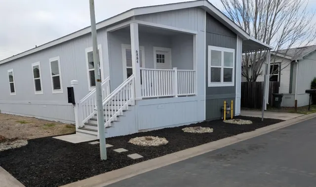 a front view of a house with entertaining space