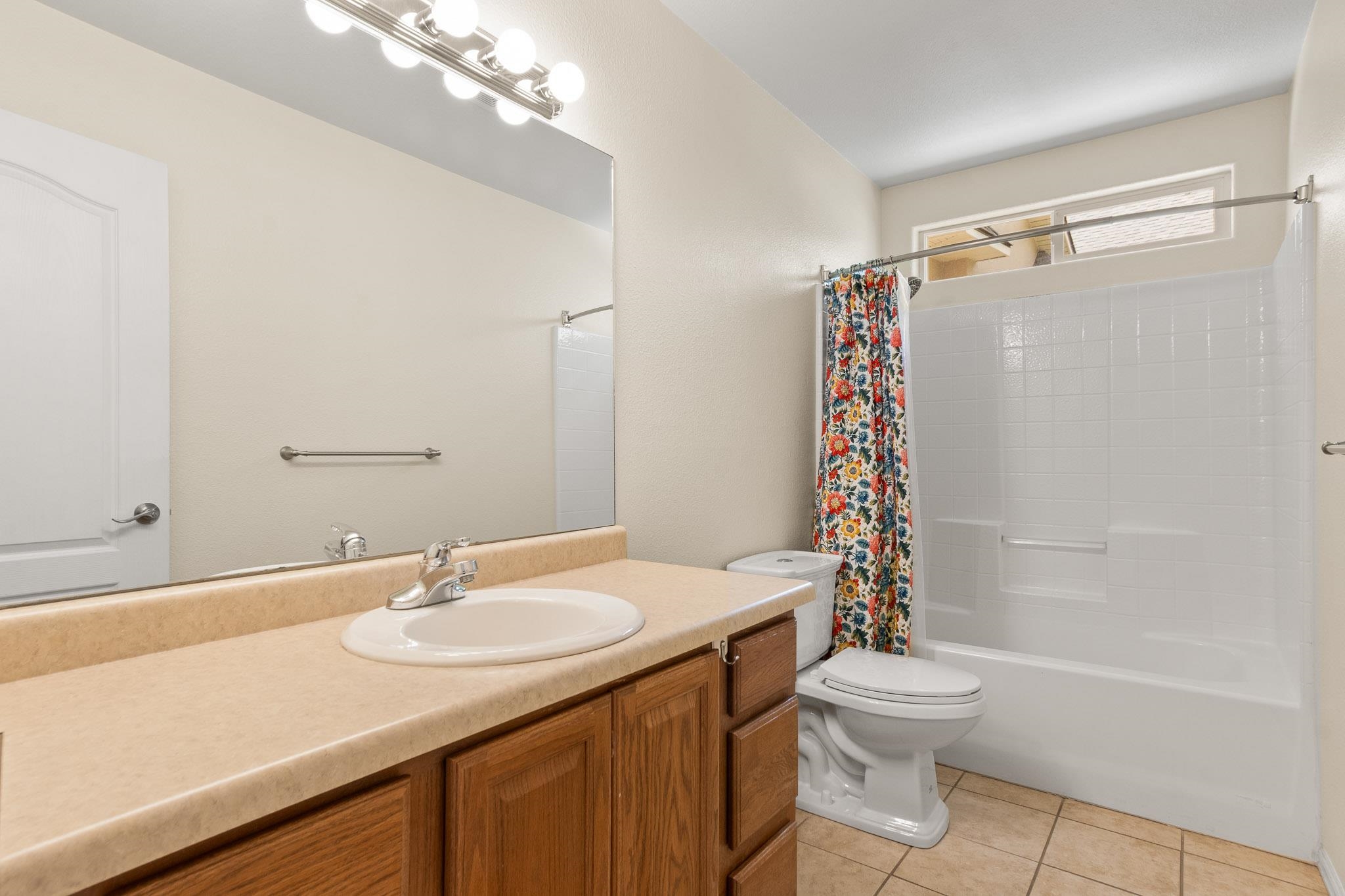 398 Butte Court Grand Junction, CO 81507 - Photo 18 of 33 a bathroom with a sink toilet and shower