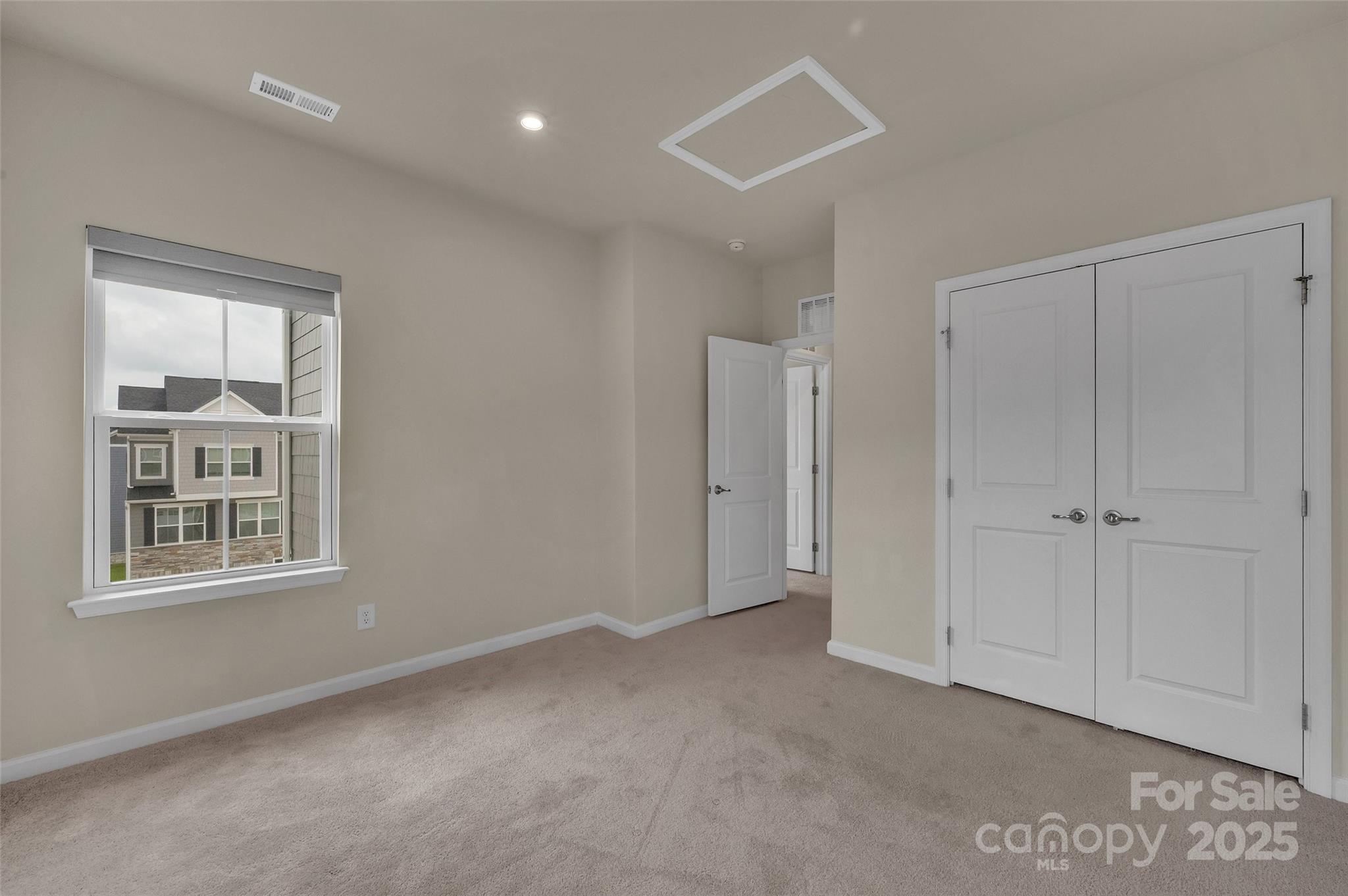 2004 Dornoch Road Tega Cay, SC 29708 - Photo 15 of 26 a view of an empty room with a window