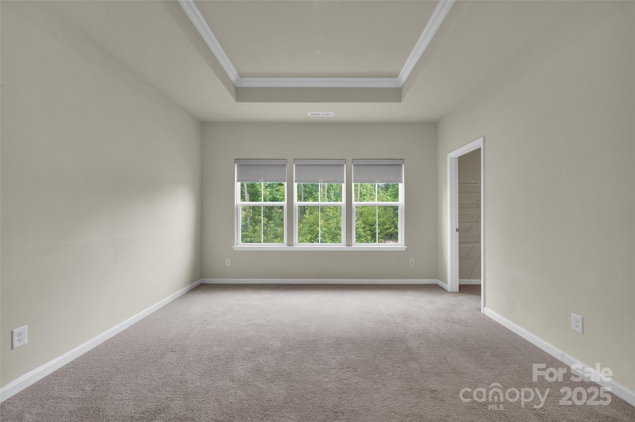 2004 Dornoch Road Tega Cay, SC 29708 - Photo 8 of 26 a view of a room that has a window in it
