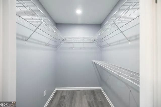 a view of a room with racks on the wall