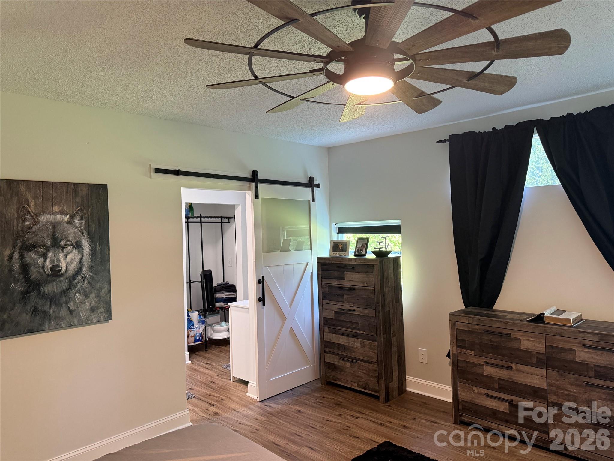 1442 Lee Pearson Road Granite Falls, NC 28630 - Photo 26 of 40 a view of room with furniture and wooden floor