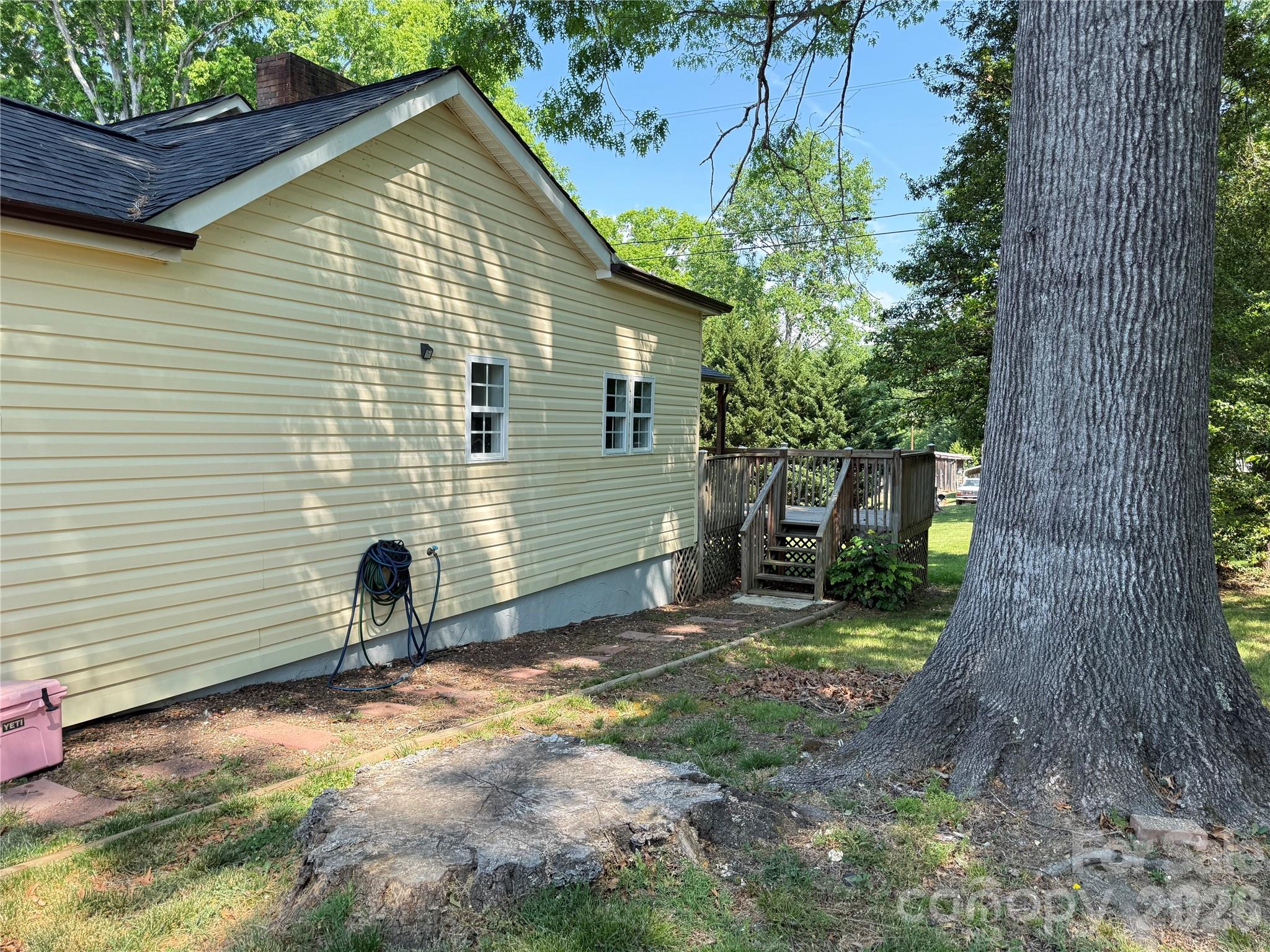 1442 Lee Pearson Road Granite Falls, NC 28630 - Photo 36 of 40 a front view of a house with garden