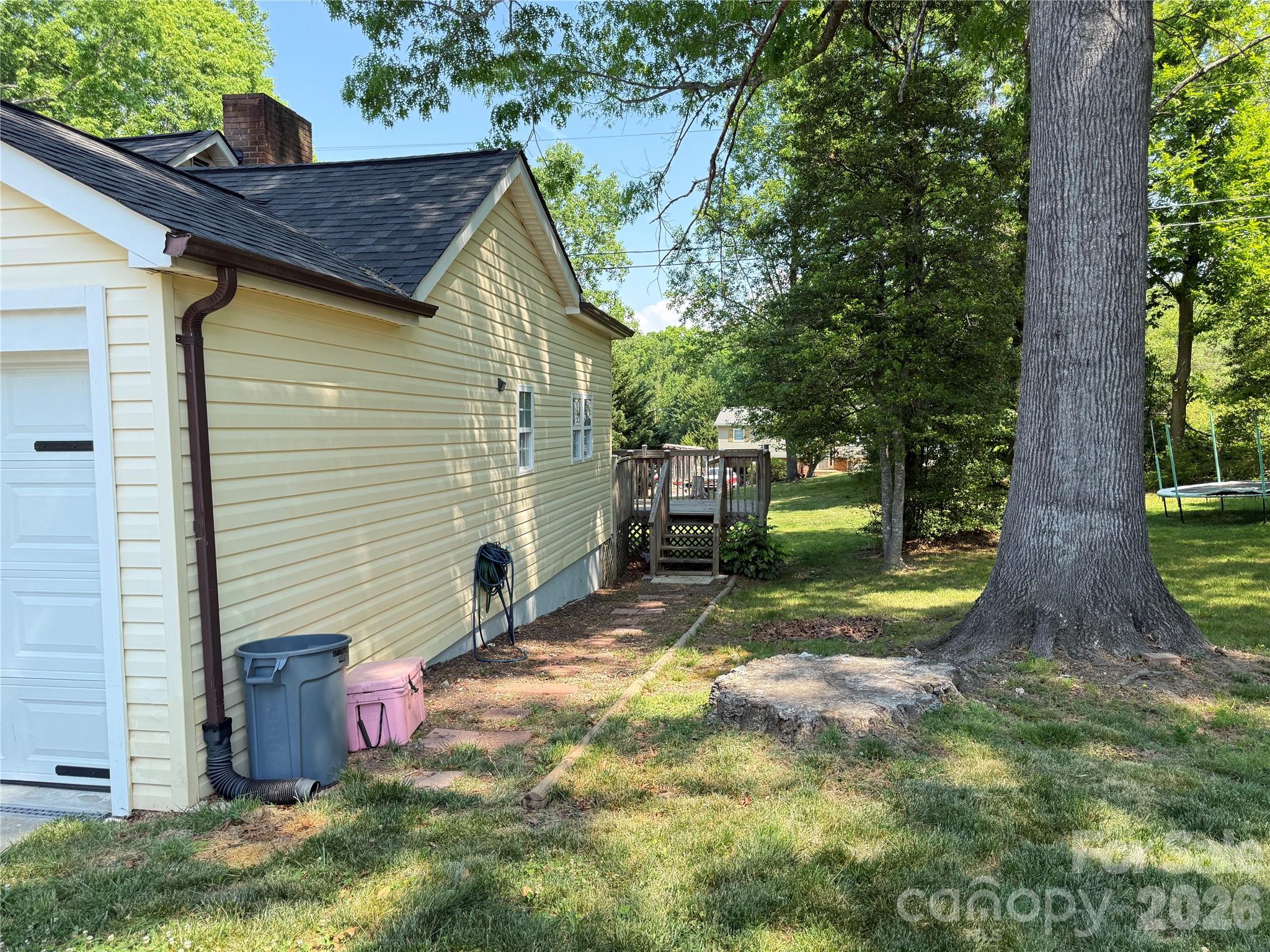 1442 Lee Pearson Road Granite Falls, NC 28630 - Photo 38 of 40 a view of a backyard with a tree