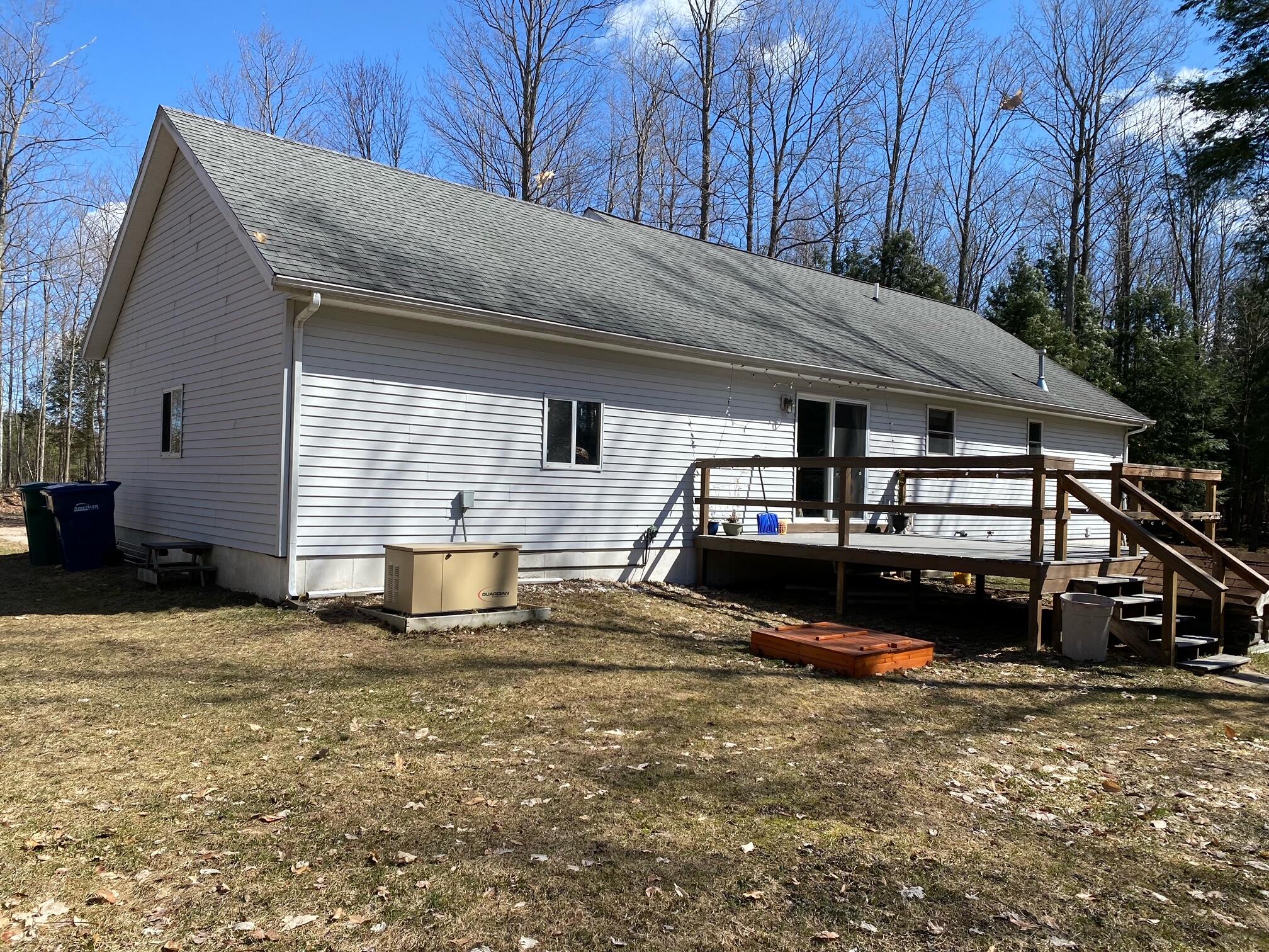 4810 East 28 Road Cadillac, MI 49601 - Photo 4 of 35 backside 1