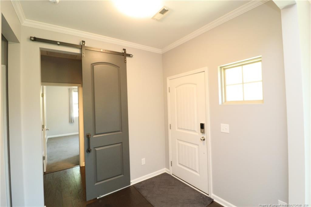 689 Wickham Ridge Road Apex, NC 27539 - Photo 2 of 37 a view of walk in closet