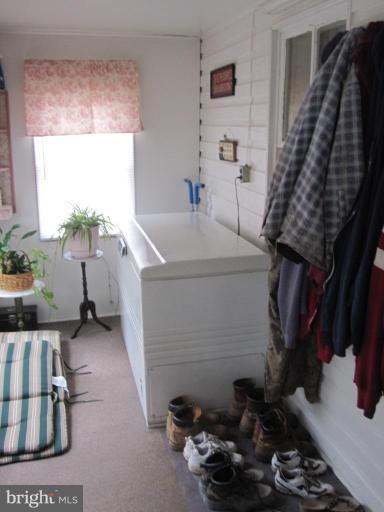 5201 Teeter Road Taneytown, MD 21787 - Photo 11 of 16 a bathroom with a sink and a mirror