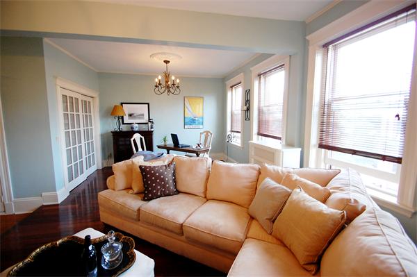 145 Charles Street, Unit 4 Boston, MA 02114 - Photo 4 of 14 a living room with furniture and a large window