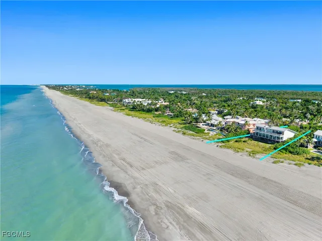 a view of a street with an ocean view