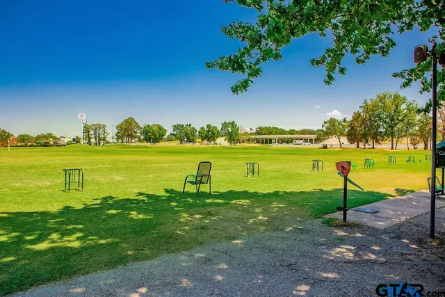 a view of a lake with a big yard