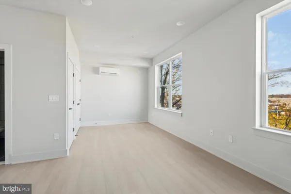 an empty room with windows