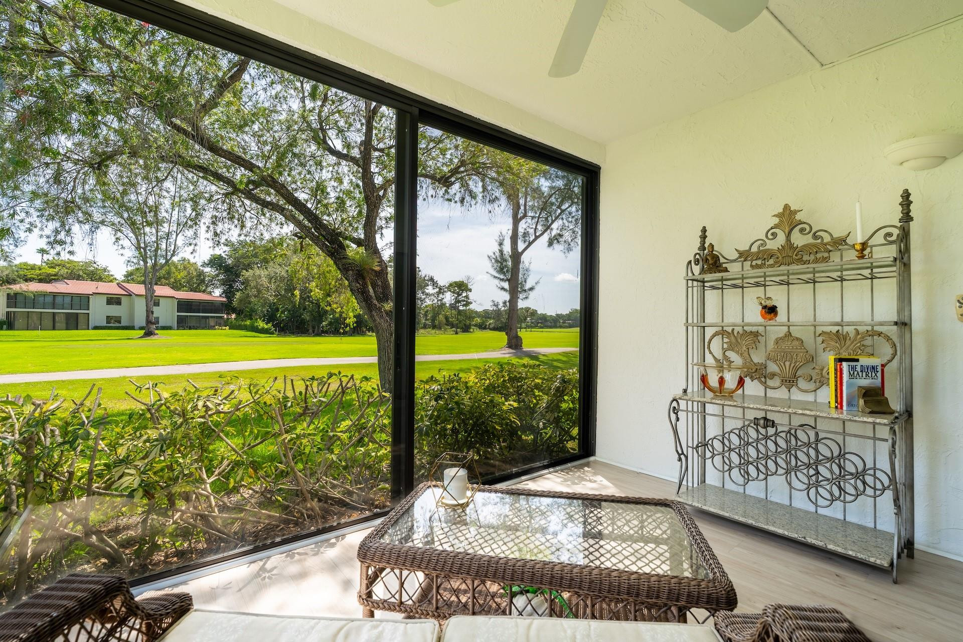 21668 Arriba Real, Unit 43A Boca Raton, FL 33433 - Photo 20 of 42 Sunroom