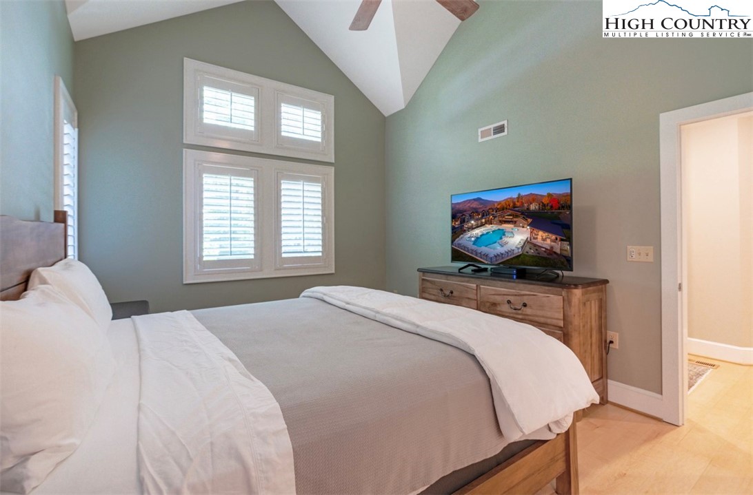 443 Echota Parkway, Unit 9B Boone, NC 28607 - Photo 16 of 43 a bedroom with a bed and a window