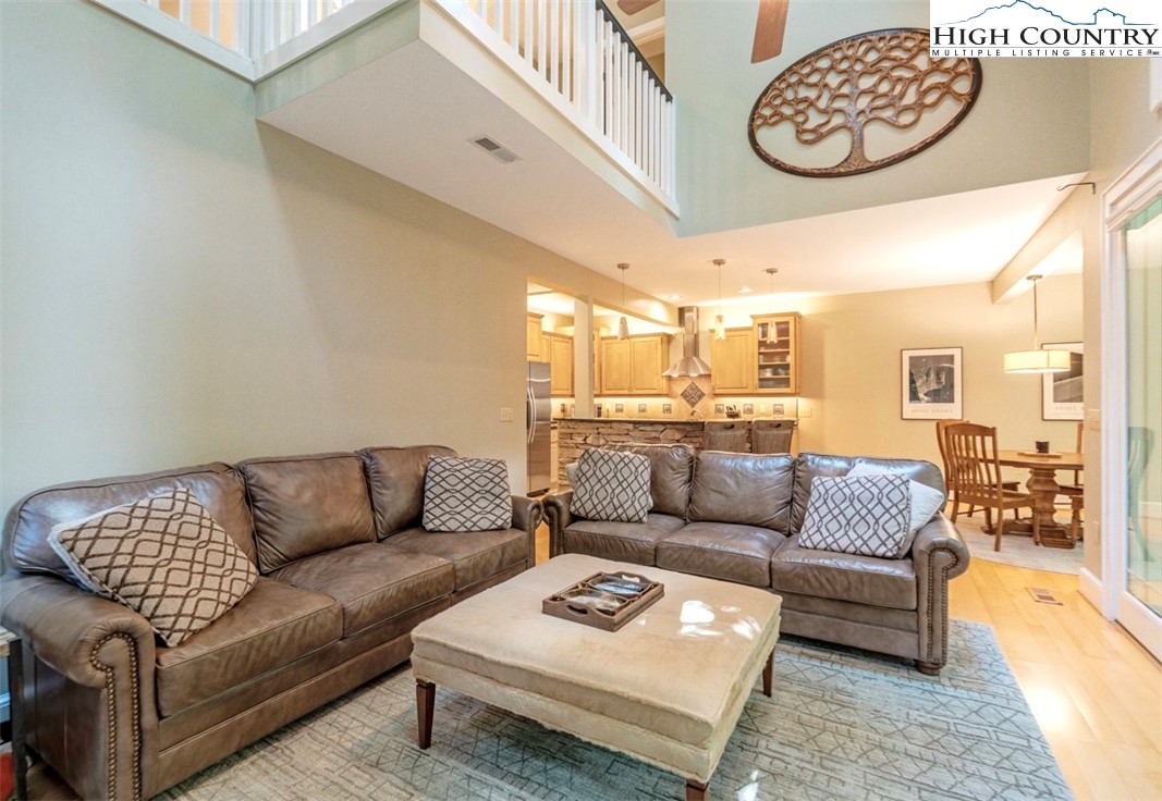 443 Echota Parkway, Unit 9B Boone, NC 28607 - Photo 5 of 43 a living room with furniture and a couch