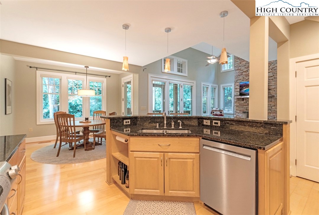 443 Echota Parkway, Unit 9B Boone, NC 28607 - Photo 8 of 43 a kitchen with a sink stove and cabinets