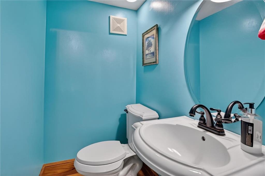 198 Dewey Street Pittsburgh, PA 15218 - Photo 11 of 45 a bathroom with a sink and a toilet