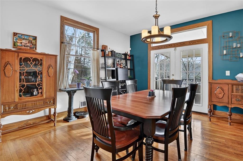 198 Dewey Street Pittsburgh, PA 15218 - Photo 12 of 45 a view of a dining room with furniture window and wooden floor