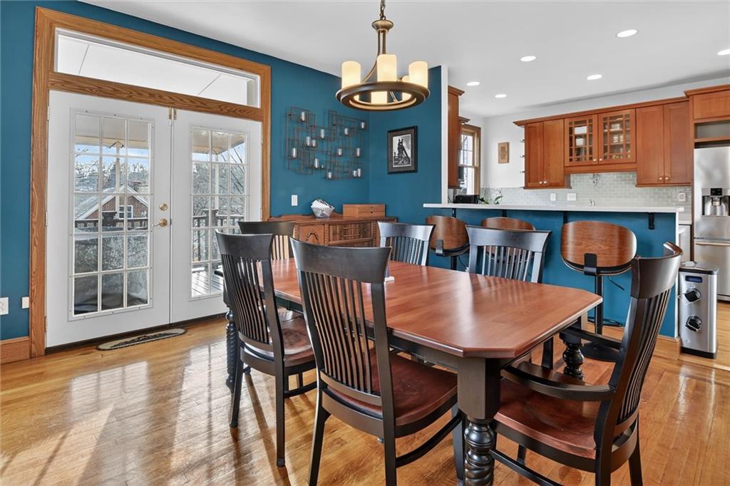 198 Dewey Street Pittsburgh, PA 15218 - Photo 13 of 45 a view of a dining room with furniture window and wooden floor