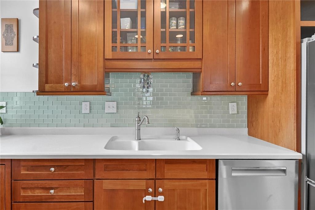 198 Dewey Street Pittsburgh, PA 15218 - Photo 20 of 45 a kitchen with a sink and cabinets