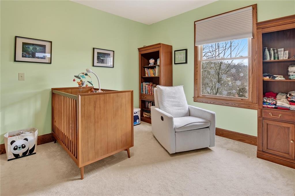 198 Dewey Street Pittsburgh, PA 15218 - Photo 29 of 45 a living room with furniture and a window