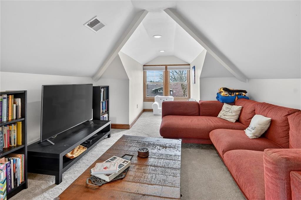 198 Dewey Street Pittsburgh, PA 15218 - Photo 34 of 45 a living room with furniture and a flat screen tv
