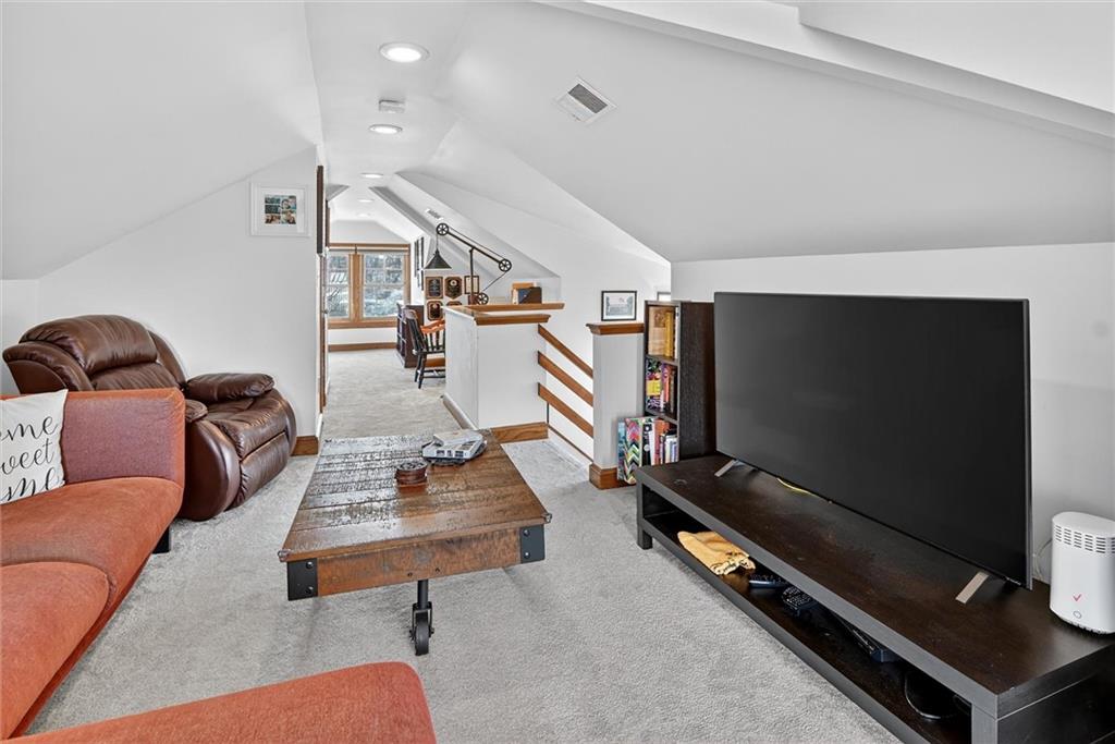 198 Dewey Street Pittsburgh, PA 15218 - Photo 35 of 45 a living room with furniture and a flat screen tv