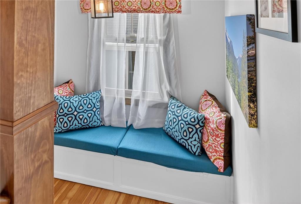 198 Dewey Street Pittsburgh, PA 15218 - Photo 39 of 45 a living room with furniture and a rug